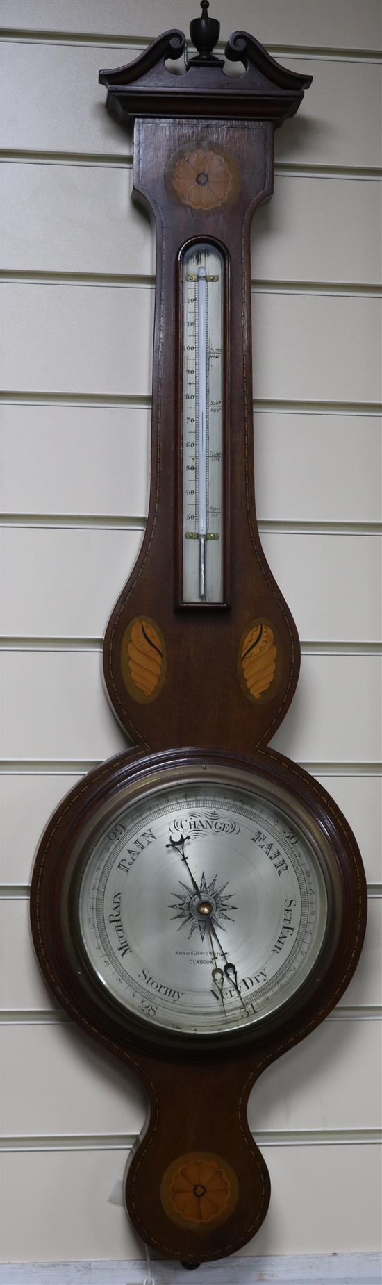 An Edwardian inlaid mahogany wheel barometer, by Kelvin James White of Glasgow, W.27cm